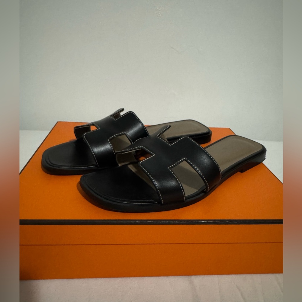 Hermes Oran Sandals in Noir (Black)